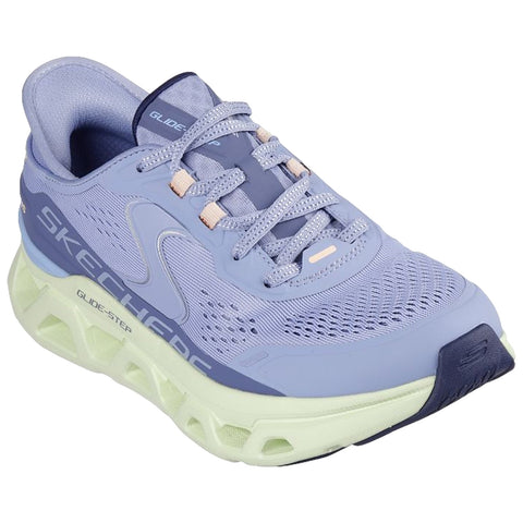 A light blue athletic shoe features a breathable mesh upper with reflective laces and cushioned sole designed for support and comfort in fitness activities placed on a neutral background