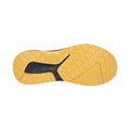 Athletic shoe sole features a textured surface with a black and yellow color scheme designed for traction and grip on various surfaces lying flat against a neutral background.