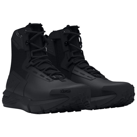 Black tactical boots are positioned side by side showcasing a sleek design and reinforced features designed for durability and grip suitable for various terrains. The outsole displays a textured pattern for traction.