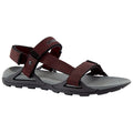 A brown and black sandal features adjustable straps and a textured sole designed for comfort and grip ideal for outdoor activities or casual wear in warm environments.