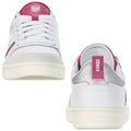 White sneakers with pink and silver accents are positioned side by side showcasing the front and back views emphasizing a stylish and sporty design ideal for casual wear.