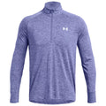 A long-sleeved athletic shirt is displayed featuring a zippered collar and a solid purple heather pattern with the Under Armour logo on the left chest area.