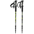 Two trekking poles with ergonomic grips and adjustable straps are positioned upright. The poles feature a vibrant design with black and green patterns suitable for outdoor activities.