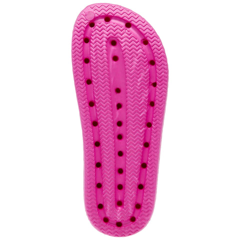 A bright pink insole features a textured surface with herringbone patterns and multiple ventilation holes, designed to provide comfort and breathability inside footwear in various casual settings.