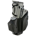 A golf bag stands upright featuring multiple zippered compartments for storage showcasing a sleek design with a mix of gray and black colors in a well-defined structured shape.