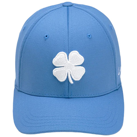 A blue baseball cap features a prominent white four-leaf clover logo on the front. The cap displays a structured design suitable for casual outdoor wear.