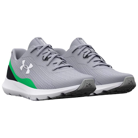 A sporty shoe with a light gray mesh upper features a green accent and black detailing while laced up sits on a white cushioned sole designed for athletic use.