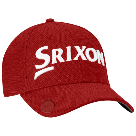 A red golf cap is positioned at an angle with the word Srixon prominently embroidered in white across the front and a logo visible on the side.