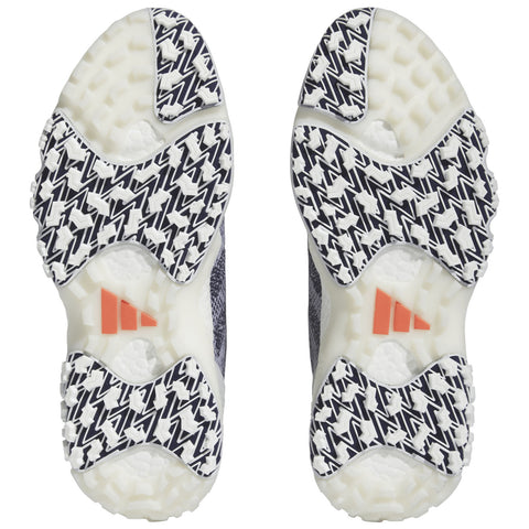 Two athletic shoe soles are displayed, featuring a textured grip pattern. They appear ready for use, showcasing a blend of white and patterned black rubber. The context suggests sports or outdoor activities.