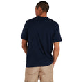 A navy blue t-shirt features a white logo text that reads "berghaus" on the front with a colored emblem. The back is plain, showing no design elements.