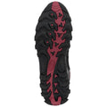 A black and red sneaker sole displays pronounced lugs for traction and grip designed for outdoor activities set against a plain white background.