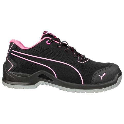 A black athletic shoe with pink accents sits on a white background featuring a textured upper design and a rubber sole indicating an active use setting suitable for sports or casual wear.