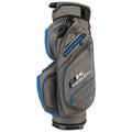 A golf bag stands upright featuring multiple compartments and zippers in gray with blue accents and the logo Powakaddy prominently displayed on its side in a neutral setting.