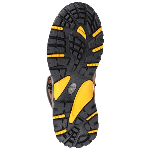 A rugged shoe sole features deep treads and yellow accents designed for traction on rough surfaces showcasing a sturdy construction suitable for outdoor activities.