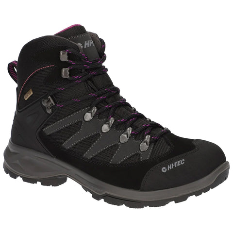 A black hiking boot with purple accents is positioned upright featuring metal eyelets and laces for securing the foot designed for outdoor activities and rugged terrain.