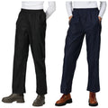 Two pairs of lightweight trousers are displayed side by side. One pair is black while the other is navy blue. Both have an elastic waistband and side pockets. Footwear worn includes chunky rubber boots and lace-up boots.