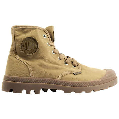 A brown canvas ankle boot stands upright showcasing its rounded toe and rubber sole while the laces are threaded through metal eyelets emphasizing its rugged design suitable for outdoor activities.