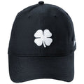 A black baseball cap features a white embroidered four-leaf clover logo prominently on the front with a clean and simple design suited for casual wear.