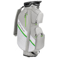 A golf bag stands upright featuring multiple zippered compartments for equipment storage the bag is primarily gray with white and green accents designed for organization and easy access during play