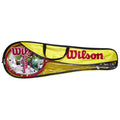 A yellow badminton racket bag with a clear window displays a red and white badminton racket inside the case showcasing the Wilson logo prominently on the front.