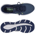 A dark blue athletic shoe is shown resting with its sole facing down and laces tied the shoe features a textured fabric upper and a flexible white outsole with a patterned tread.