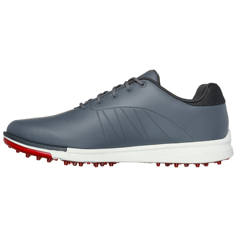 A gray golf shoe with red spikes on the sole features a smooth upper, laces for fastening, and subtle design lines on the side, suitable for outdoor sports activities.