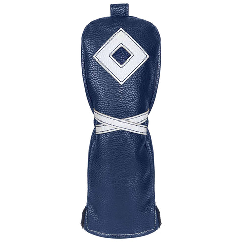 A dark blue leather golf headcover stands upright featuring a white diamond design and white laces wrapped around its body indicating its use in protecting a golf club within a golf bag.