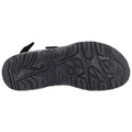 A shoe sole is displayed resting on a flat surface showcasing its textured tread designed for grip and support highlighting various patterns for traction during walking or outdoor activities.