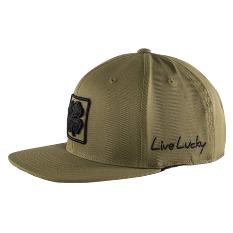 A green cap with a flat brim features a black four-leaf clover emblem on the front and the phrase Live Lucky embroidered on the side in black thread.