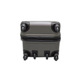 A gray suitcase with wheels sits upright on a flat surface showcasing its compact design and a zippered opening at the top ready for travel and packing essentials.