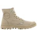 High-top khaki canvas boot with rubber soles and laces is positioned upright showcasing its fabric and logo in a plain, neutral background emphasizing the footwear's design and features.