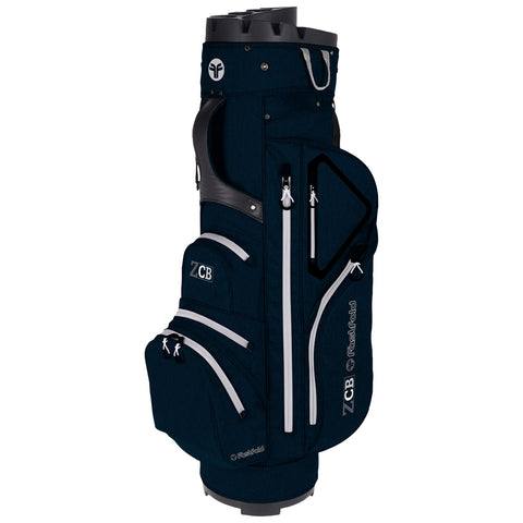 A navy golf bag stands upright featuring multiple zipped pockets for storage and a hard top with a handle for easy carrying in a golfing environment.