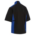 A large short-sleeved jacket with a black body and blue side panels hangs upright The collar is high and features the logo on the back