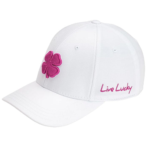 A white baseball cap features a pink four-leaf clover design on the front and the phrase Live Lucky embroidered in pink on the side, suitable for casual outdoor wear.