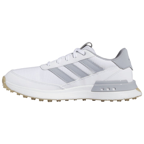 A white athletic shoe with gray accents sits on a flat surface showcasing a sleek design and textured sole ideal for sports or casual wear without any visible text.