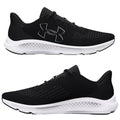 Black athletic shoes with a white sole are displayed from side angles. They feature a sleek design with mesh panels and laces for a secure fit, ideal for running or training.