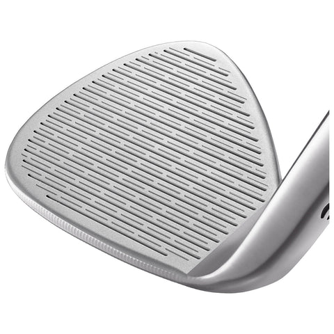 A golf wedge is positioned at an angle showcasing its grooved face designed for improved grip on the golf ball in a sports setting.