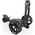 A black and gray golf push cart with large wheels is positioned at an angle showcasing its compact design and integrated features for transporting golf equipment in a clean white background