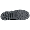 A black shoe sole features a textured rubber surface with a zigzag pattern and multiple grooves for grip and traction laid against a plain background.