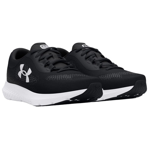 Black athletic shoes with white detailing are positioned side by side showcasing a sleek design made for running or training in a neutral background emphasizing their modern style and functionality