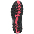 A black shoe sole with prominent treads and a pink accent is displayed upright showcasing its rugged design for traction and stability in outdoor activities.