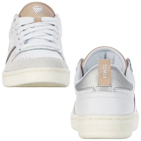 White sneakers with grey and silver accents are positioned upright displaying their laces and logo while set against a plain background highlighting their design and color scheme