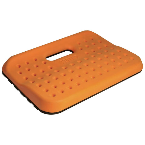 An orange kneeling pad with a textured surface and a handle in the center supports comfortable kneeling during tasks. It rests on a flat surface, providing stability and cushioning.