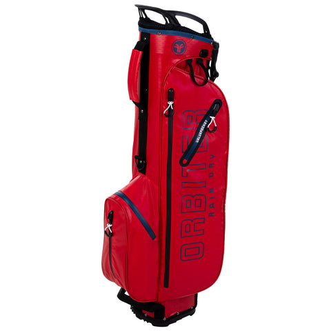 A red golf bag stands upright featuring multiple compartments and a branded logo prominently displayed its design is for waterproof protection suitable for rainy weather conditions.