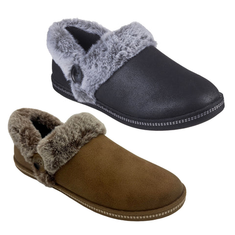 Two pairs of cozy slippers are displayed side by side the top pair is black with a gray fur trim and the bottom pair is brown with a tan fur trim both have soft interiors.