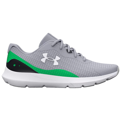 Gray athletic shoes with black and green accents are positioned side by side showcasing a textured upper surface and a white midsole designed for comfort and support in fitness activities.