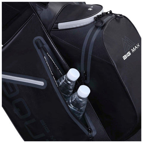 A black golf bag displays two water bottles nestled in a side pocket while featuring a top compartment and zippers for storage in a sleek design emphasizing utility.