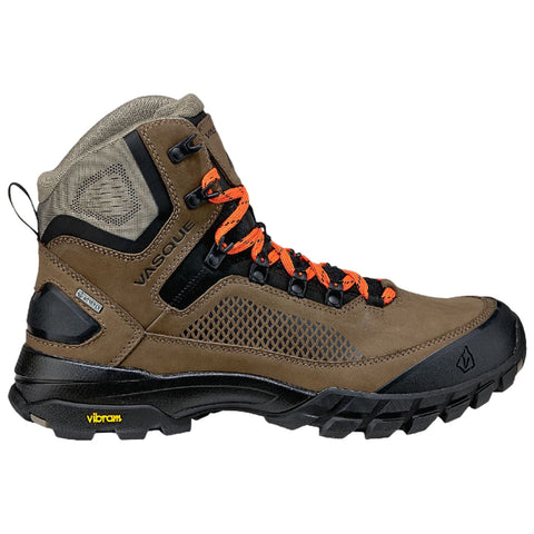 A brown hiking boot with a textured upper and vibrant orange laces is displayed standing upright against a plain background showcasing its durable outsole and supportive ankle design.