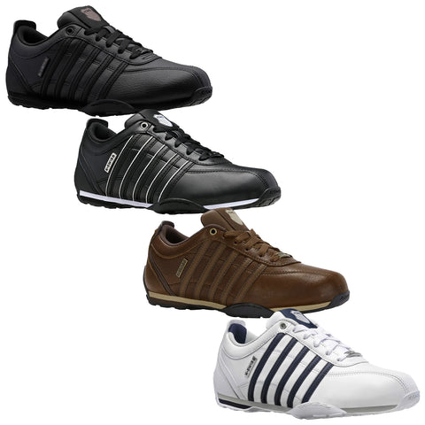 A variety of stylish athletic shoes arranged in two rows display different colors and designs including black brown white and tan featuring stripes and laces showcasing modern footwear aesthetics.