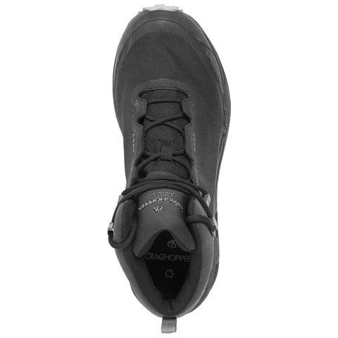 A black hiking shoe is positioned upright showcasing its lacing system and textured surface highlighting its durable design suitable for outdoor activities and rugged terrains.